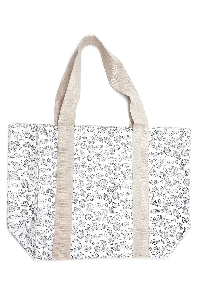 Tote bag with a pattern of sea shells on a white background