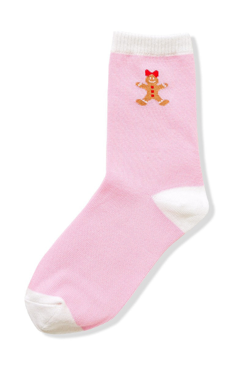 Pink sock with a gingerbread man design on a white background