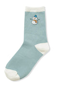 Blue sock with a snowman design on a white background