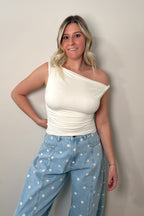 Front view of the Clean Slate white ruched top showing its slanted off-the-shoulder neckline and fitted silhouette.

