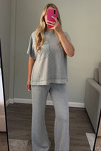Front view of Honeycomb lounge set showing the oversized pocket tee worn untucked over matching pants