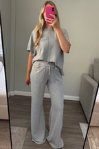 Full-length view of dusty blue honeycomb lounge set showing the relaxed fit and long wide leg pants